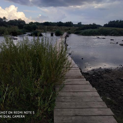 Фото Пішохідний місток через річку Інгул